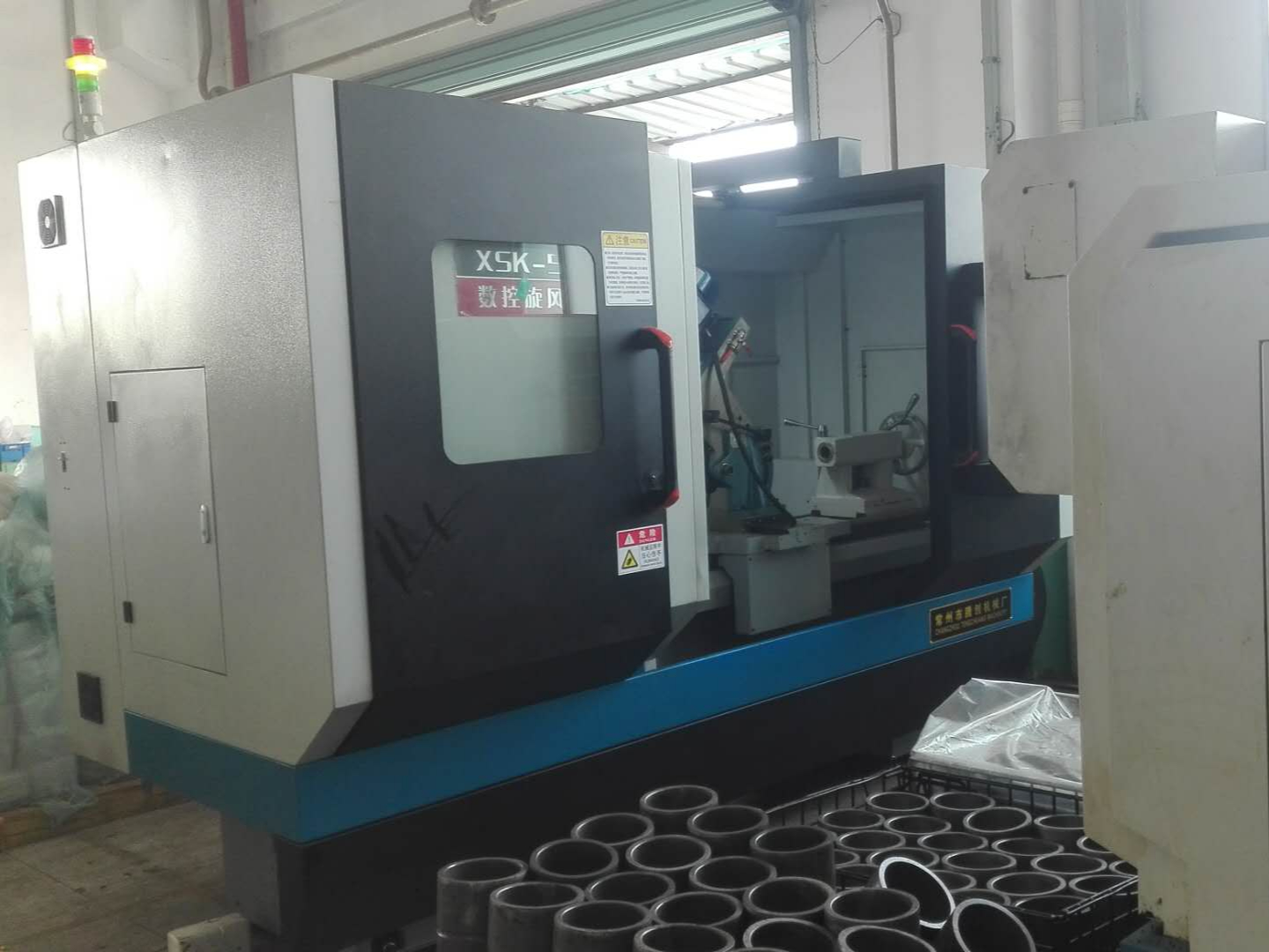 曲面油槽數(shù)控旋風(fēng)銑福建龍溪軸承集團客戶現(xiàn)場